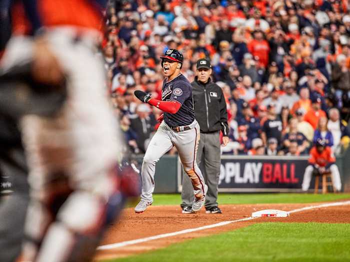Juan Soto rounds third base